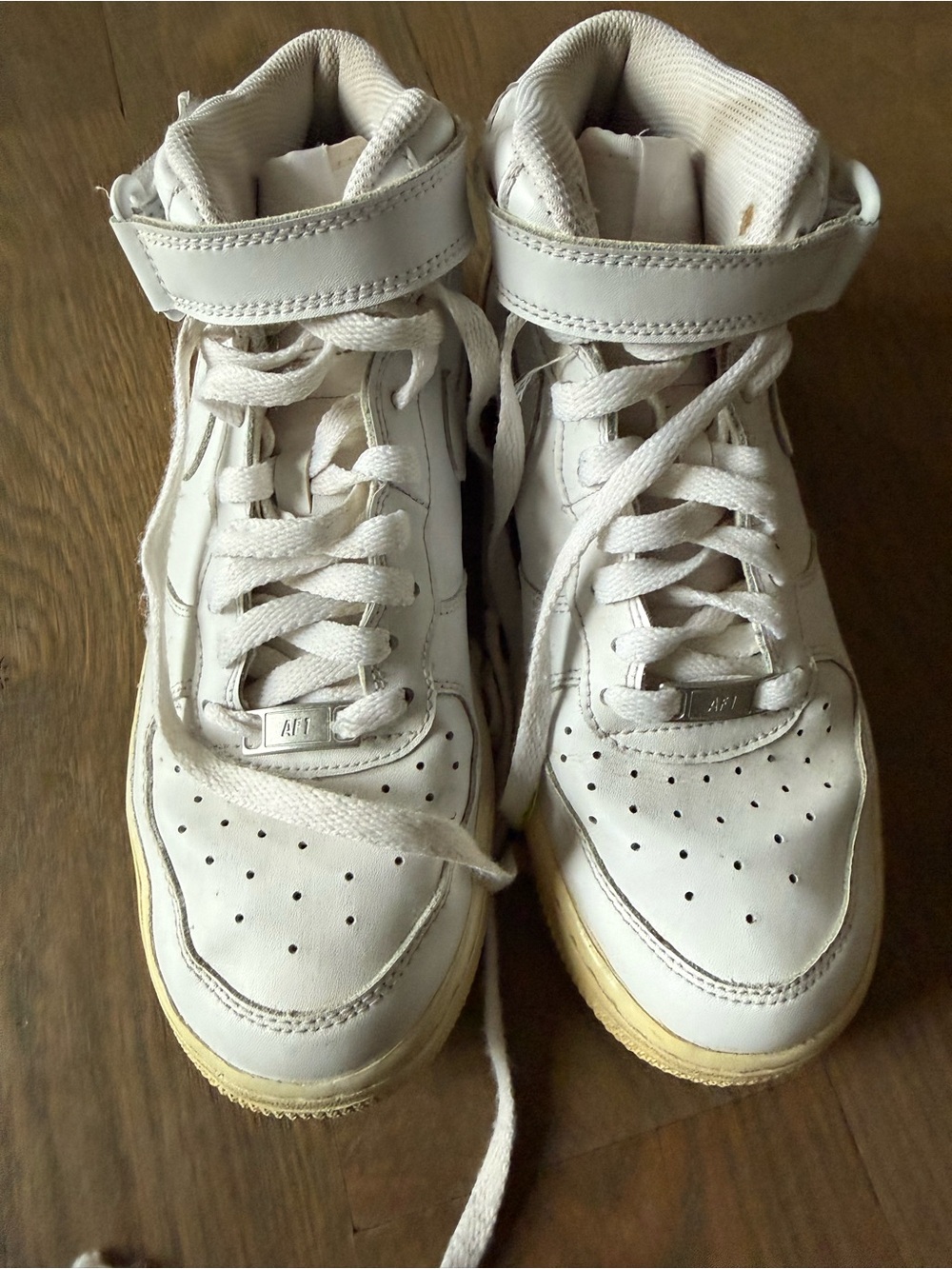 Nike White Athletic Sneakers with Black Logo